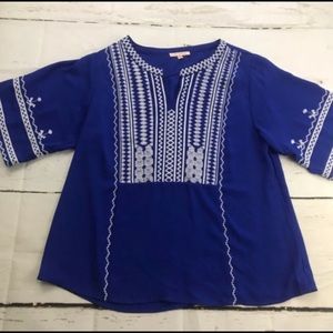 Skies are blue royal blue tunic top white pattern